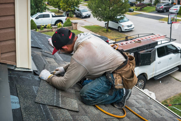 Professional Emergency Roof Repair technician working in Haledon, NJ